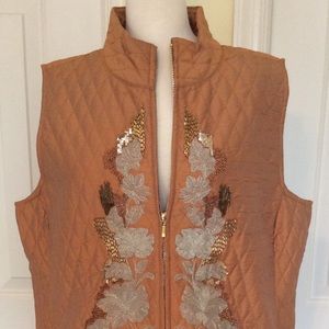 Chico’s gold quilted vest; novelty gold appliqué.
